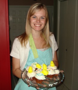 Yours truly, with a platter of homemade carrot cake cupcakes.